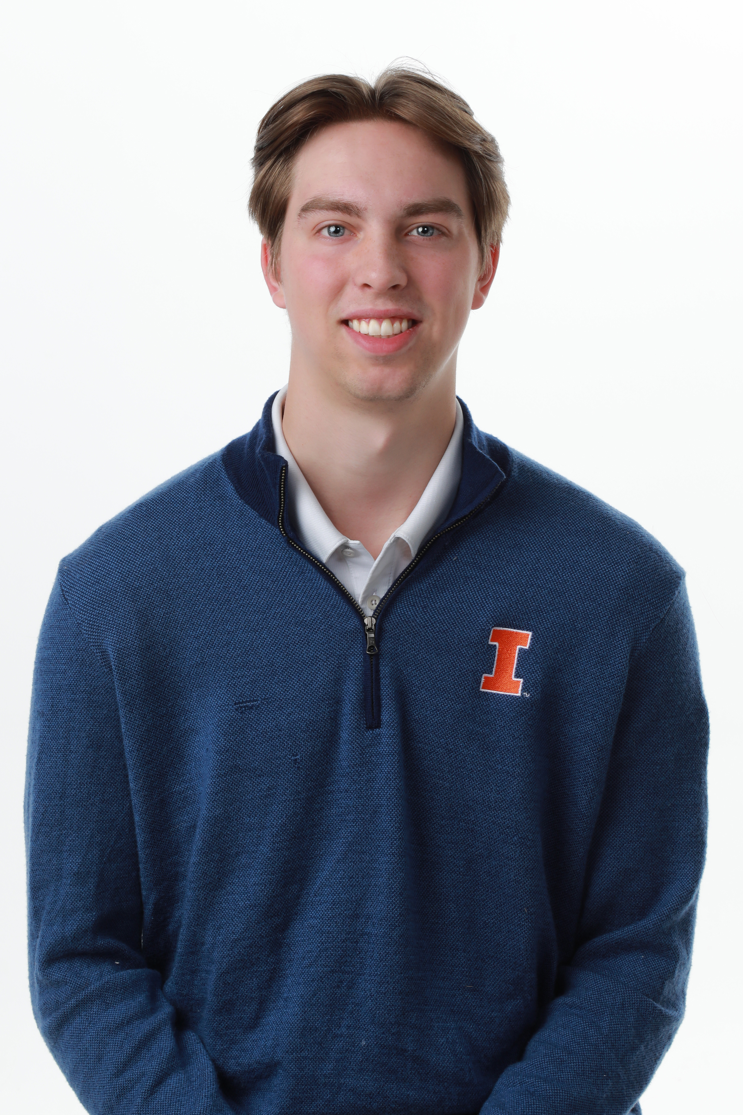 Matt Isaacs posed with blue sweater and Block I. Associate Investment Representative.